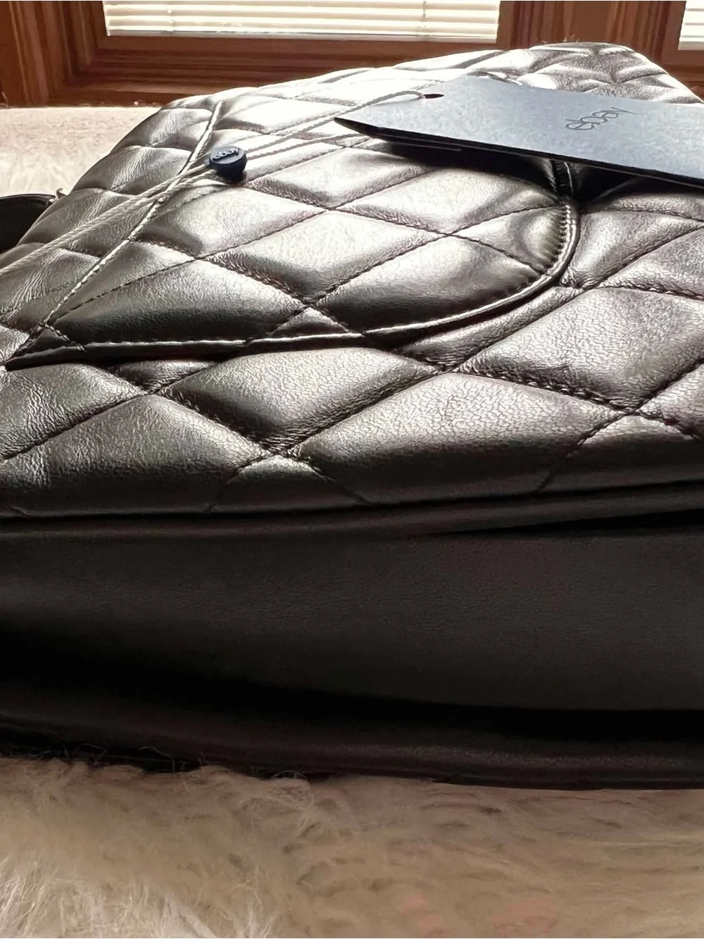 CHANEL Black Quilted Leather Shoulder Bag with Silver CC Turnlock Medium
